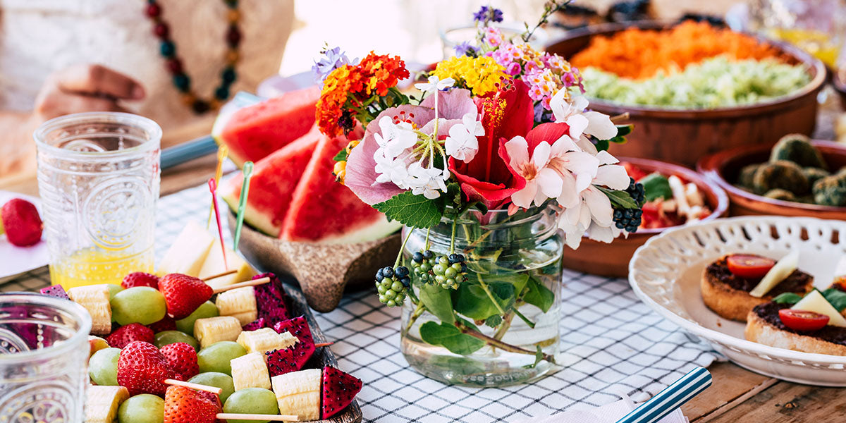 Outdoor dining table set up with spring snacks