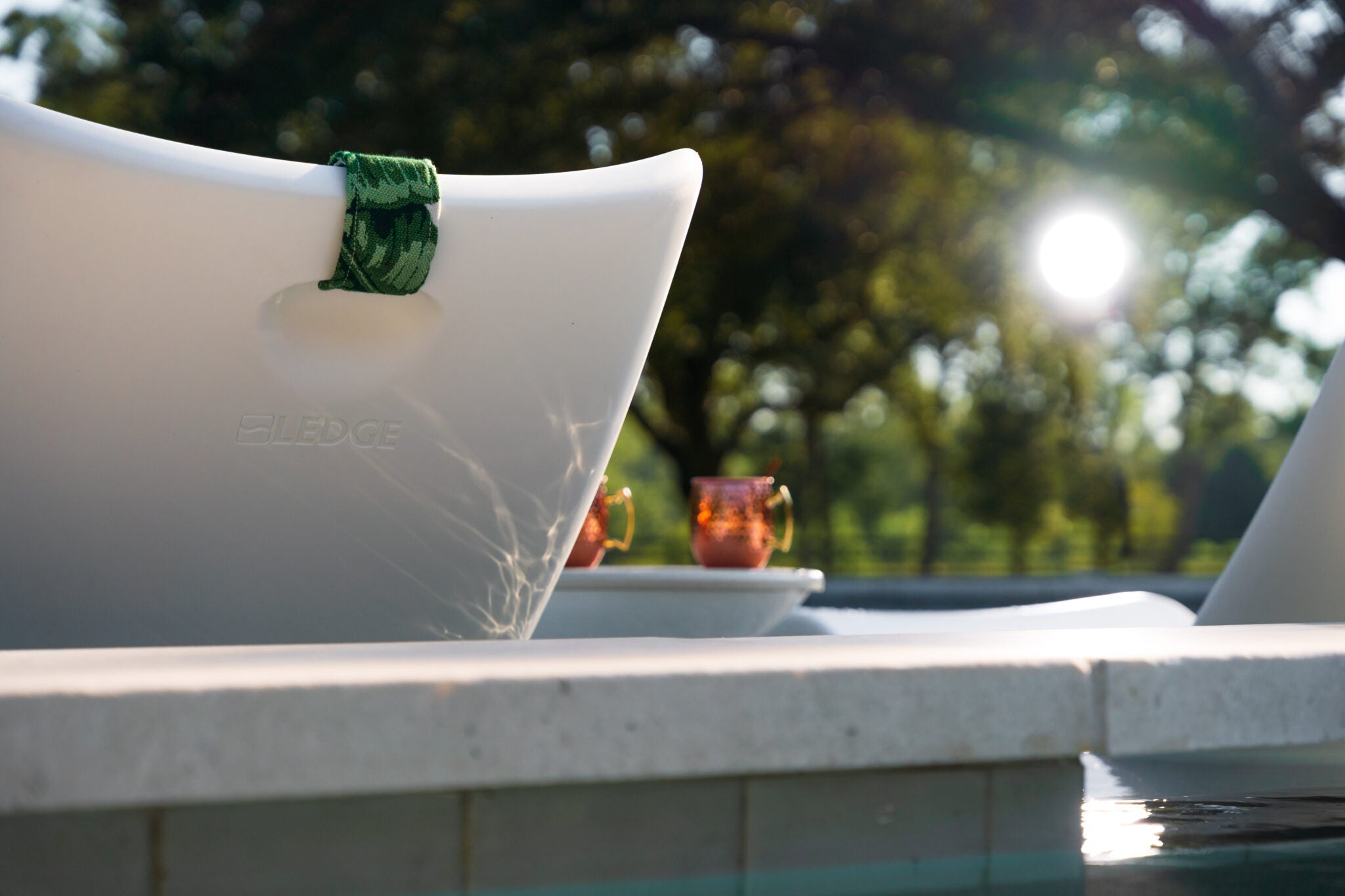 Pool Furniture Materials Guide: What Furniture Should You Put In Your - Pool Furniture Made From Reclaimed Materials