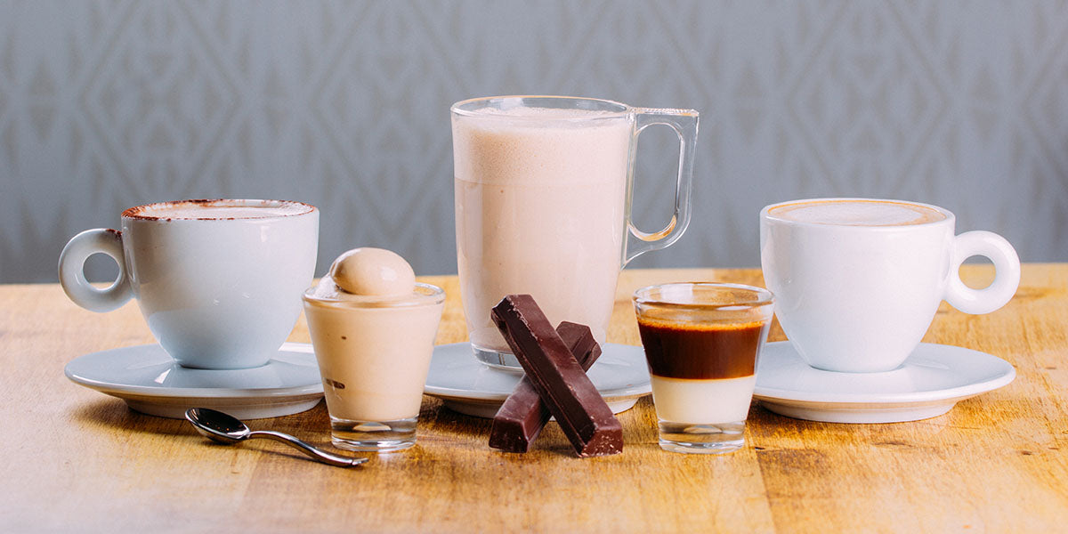 Hot drinks sitting on the table