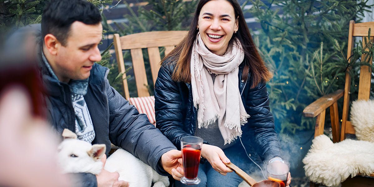 Friends enjoying an outdoor winter party