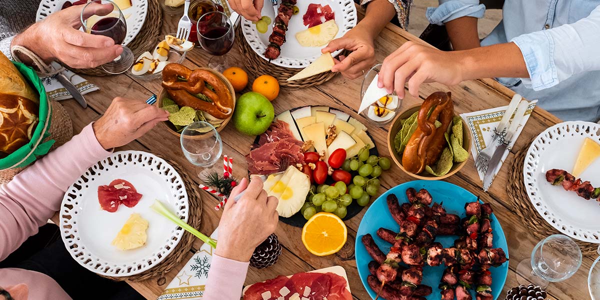 Table full of finger foods for a delicious spread