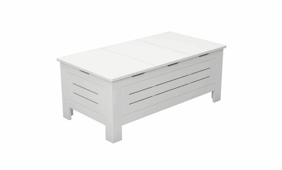 The Mainstay Storage Coffee Table by Ledge Lounger is a white wooden piece with a modern design. It features paneled sides with horizontal slats, ample storage space, and stands gracefully on four short legs, making it a stylish addition to your living room.