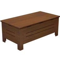 The Mainstay Storage Coffee Table by Ledge Lounger is wooden with a rectangular shape, flat lid, and horizontal slats on the sides. It stands on four short legs and its natural brown finish beautifully complements any outdoor living space.