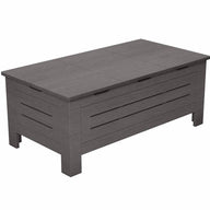 The Ledge Lounger Mainstay Storage Coffee Table features a gray wooden rectangular design with a hinged lid and slatted sides for ample storage. It stands on four short legs, adding style to any outdoor living area.