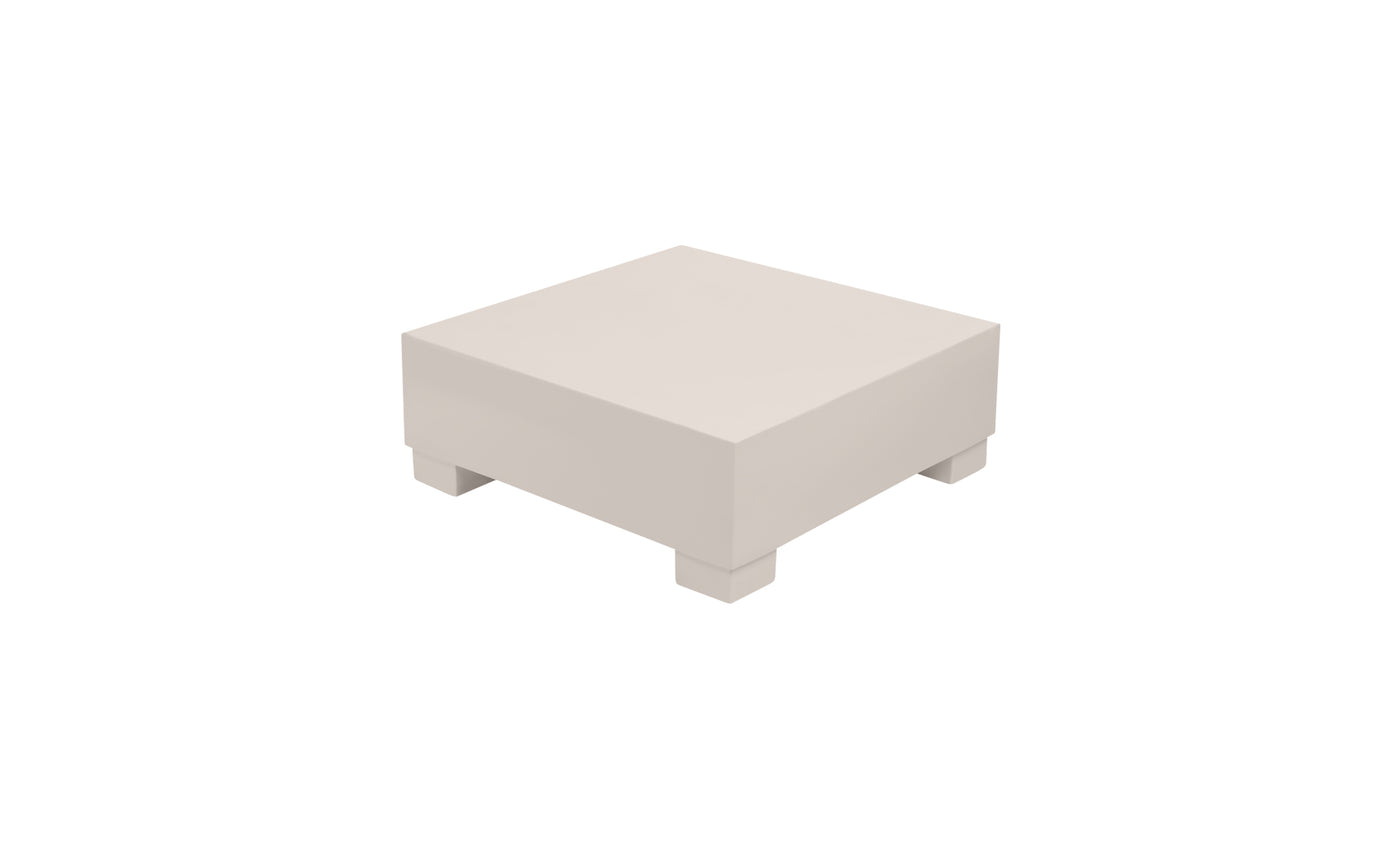 Beige, modern Signature Coffee Table by Ledge Lounger, with a square design, flat top, and four short legs, viewed from a slight angle against a white background.