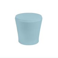 The Affinity Side Table by Ledge Lounger is a light blue, cylindrical piece with a slightly rounded top, ideal as an outdoor accessory and displayed against a white background.