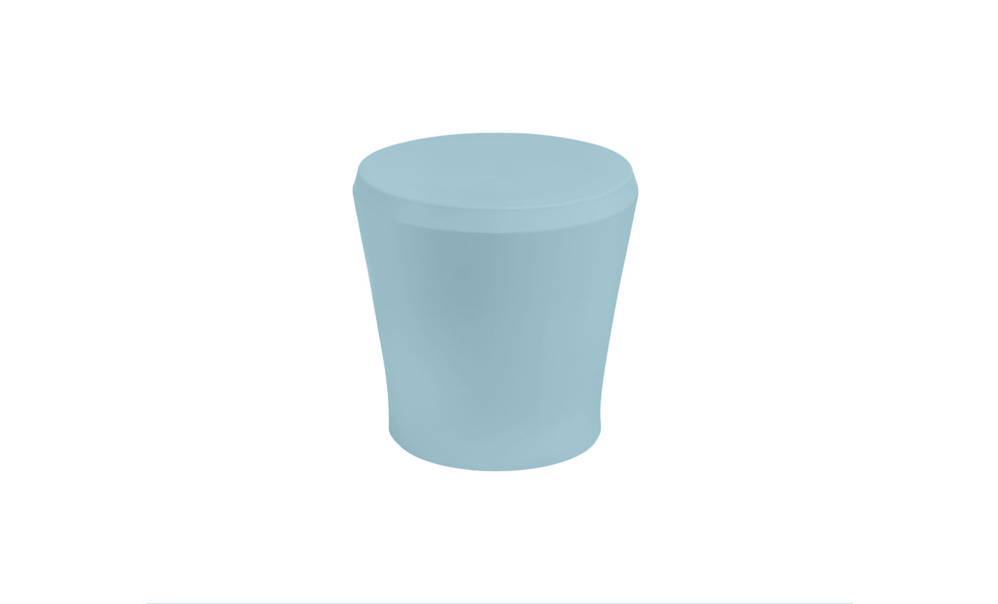 The Affinity Side Table by Ledge Lounger is a light blue, cylindrical piece with a slightly rounded top, ideal as an outdoor accessory and displayed against a white background.