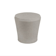 The Affinity Side Table by Ledge Lounger is a cylindrical, light gray stool with a slightly tapered base, set against a white background. Ideal for outdoor use, its minimalist design and clean lines add versatile style to any space.