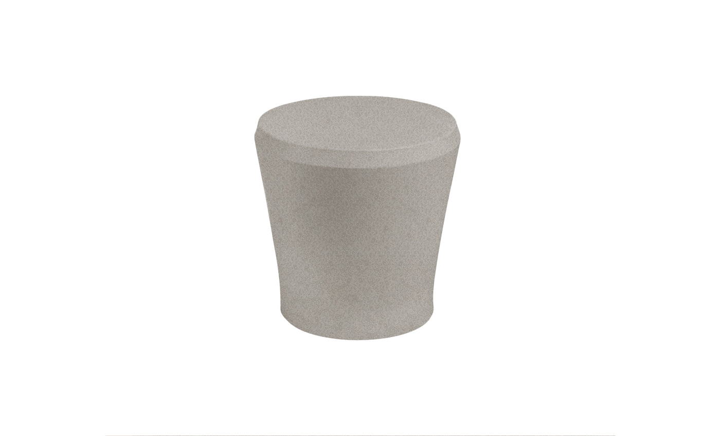 The Affinity Side Table by Ledge Lounger is a cylindrical, light gray stool with a slightly tapered base, set against a white background. Ideal for outdoor use, its minimalist design and clean lines add versatile style to any space.