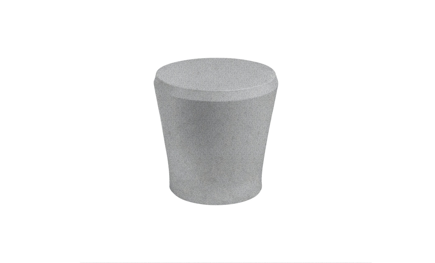 The Affinity Side Table by Ledge Lounger, with its cylindrical gray design and slightly tapered shape, serves as a chic outdoor accessory against a white background.
