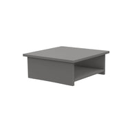 Introducing the Echo Side Table by Ledge Lounger – a sleek, modern gray pedestal with a minimalist rectangular design. Ideal for patio essentials, it boasts a flat top and an open shelf below, showcased elegantly against a plain white backdrop.