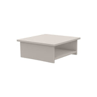 The Echo Side Table by Ledge Lounger, featured in light gray with a square shape, flat top, and lower shelf, offers minimalistic design ideal for modern interiors. Displayed against a white background. Final Sale.