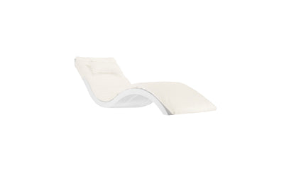 A modern, minimalist white lounge chair from Ledge Lounger features a wave-like ergonomic design and comes with the Signature Chaise Cushion for reclining plus a matching headrest pillow, all set against a plain white background.