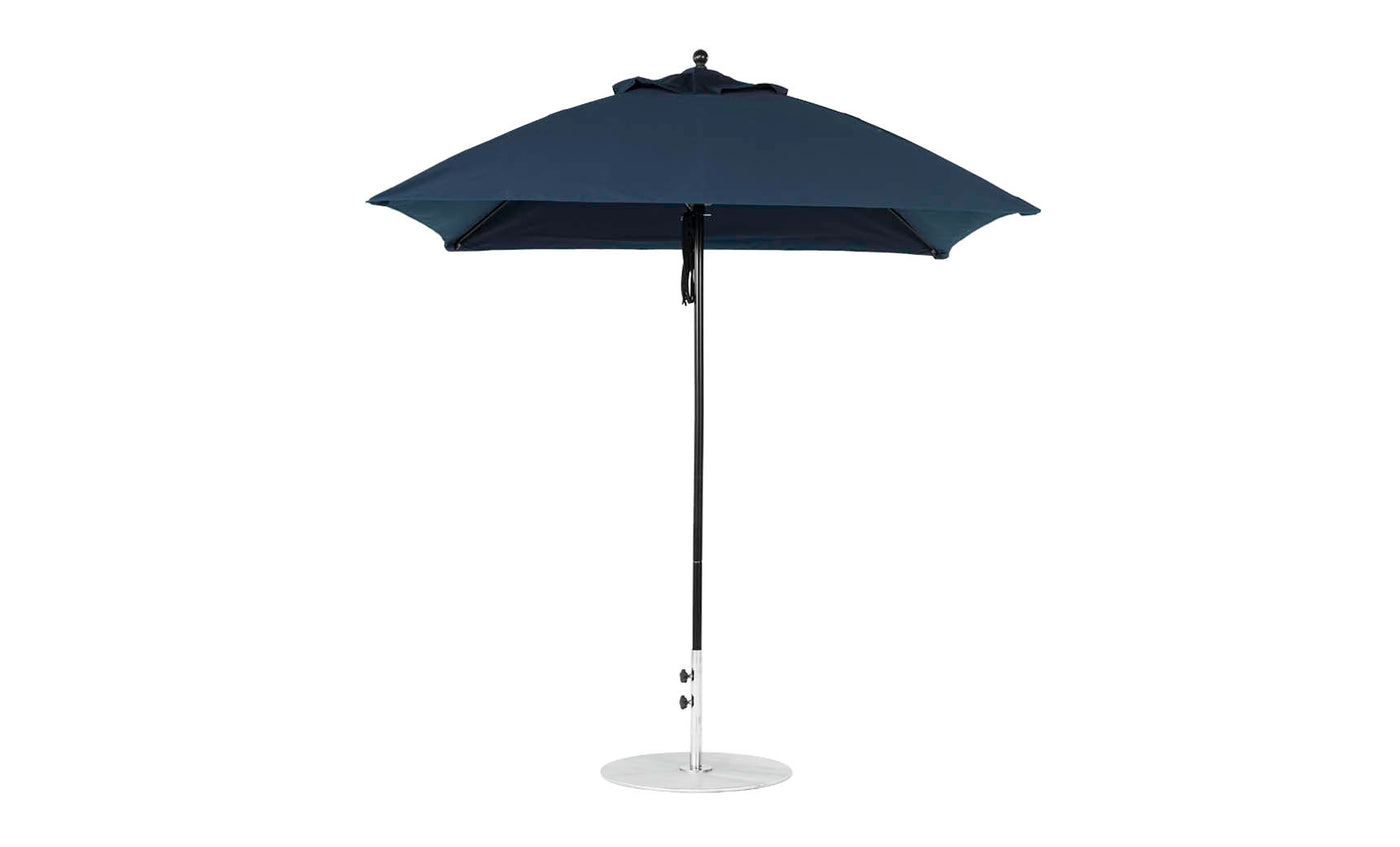 A fully opened Essential Fiberglass Umbrella - 7.5 Square Pulley, by Ledge Lounger, crafted with marine-grade fabrics in dark blue, is supported by a metal pole and round base against a plain white background.