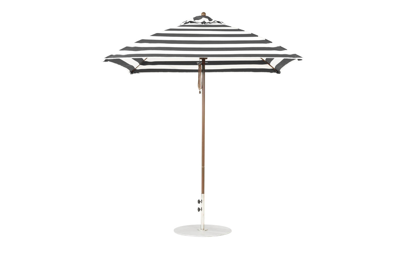 The Ledge Lounger Essential Fiberglass Umbrella in black and white stripes, with marine-grade fabric and a wooden pole, boasts a 7.5 square design with a round white base, showcasing its classic pattern when open.