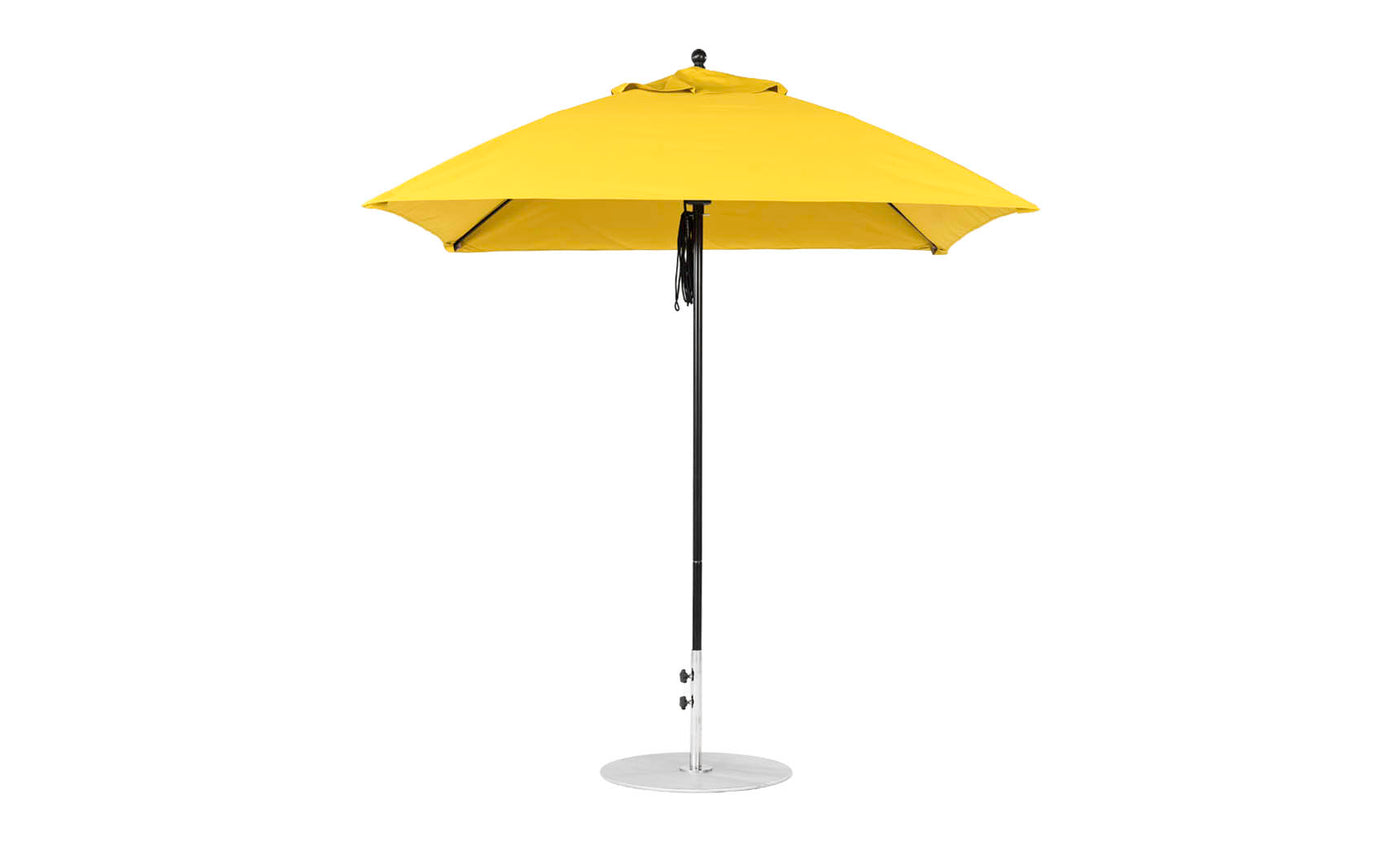 The Ledge Lounger Essential Fiberglass Umbrella - 7.5 Square Pulley features a yellow marine-grade fabric canopy with a silver pole and round base, providing vibrant shade and durability for outdoor settings.