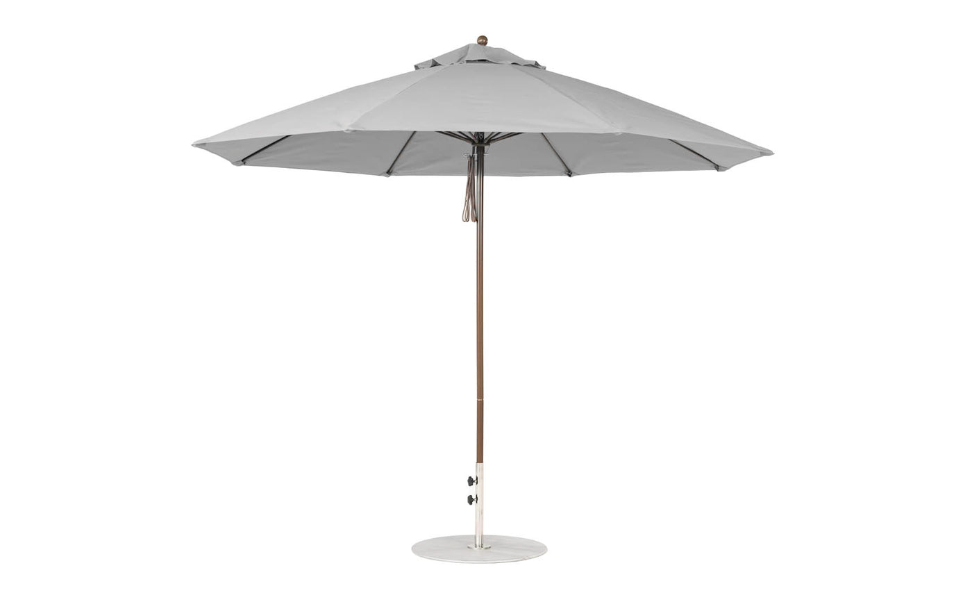 The Ledge Lounger Essential Fiberglass Umbrella - 11 Octagon Pulley features a round canopy with a central pole on a circular base. Made from marine-grade fabrics, this wind-resistant umbrella provides ample shade and its simple, modern design suits any outdoor setting.
