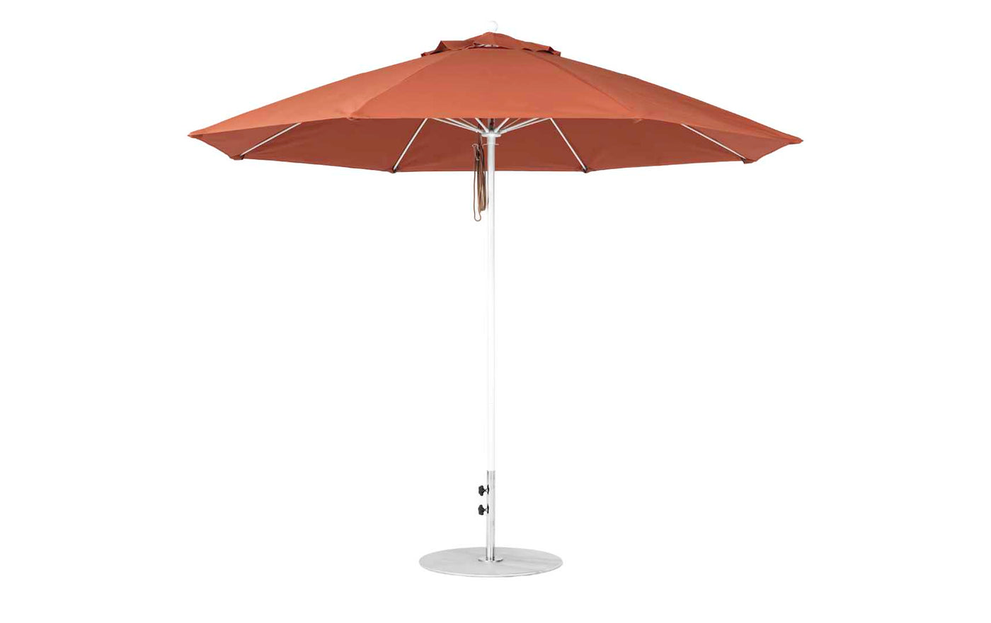 The Ledge Lounger Essential Fiberglass Umbrella features a rust-colored canopy made from marine-grade fabrics, an 11 octagon shape with a pulley system, a straight white pole, and sits on a circular flat base.