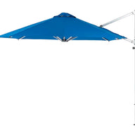 The Ultra Cantilever Umbrella - 11 Octagon from Ledge Lounger is a large, blue cantilever outdoor patio umbrella featuring an integrated rechargeable light. It opens with a robust metal stand on the side, maximizing shaded coverage without needing a central pole.