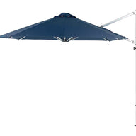 The Ultra Cantilever Umbrella - 11 Octagon by Ledge Lounger enhances the patio with its freestanding blue canopy, silver pole, and adjustable arm. It opens fully to reveal an octagonal shape against a plain white background and includes a rechargeable outdoor umbrella light for evening ambiance.