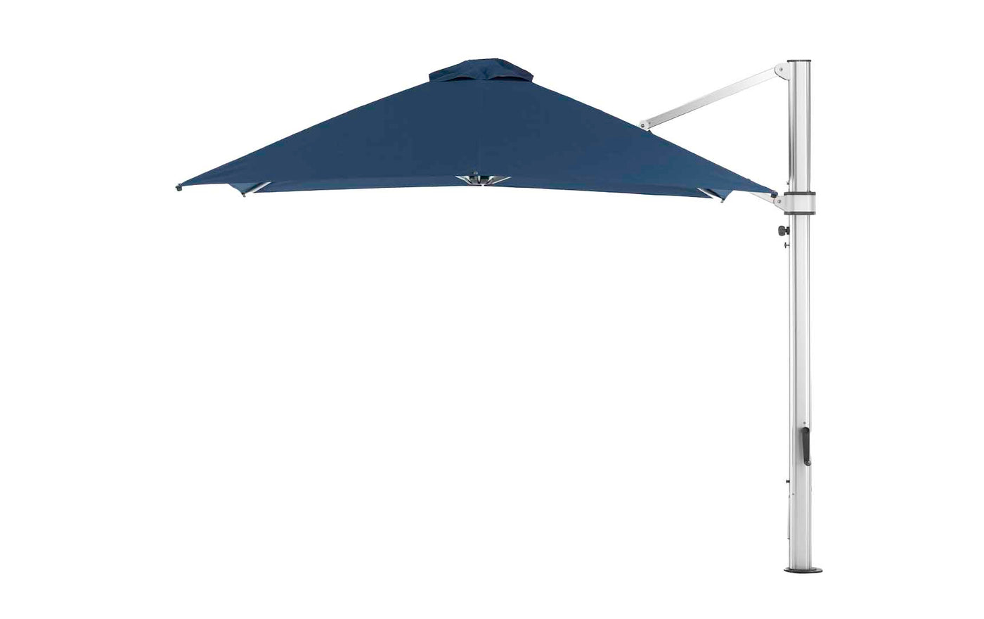 The Ledge Lounger Ultra Cantilever Umbrella - 10 Square in navy blue features a metallic stand and adjustable arm, paired with a rechargeable light. Its wide open canopy provides ample shade while the stand is set aside.