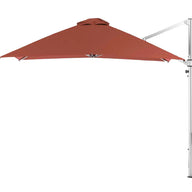 The Ultra Cantilever Umbrella by Ledge Lounger features a 10 square brown canopy, silver metal stand, and sleek outdoor umbrella light. Tilted open right side against a white background, it adds elegance to any patio setup.