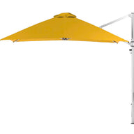 A yellow Ultra Cantilever Umbrella by Ledge Lounger with a square design is mounted on a white pole stand, featuring a rechargeable outdoor umbrella light, all set against a plain white background.