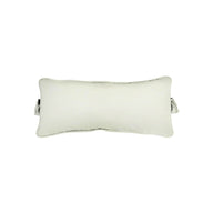 The Signature Headrest Pillow by Ledge Lounger, a rectangular pillow with slightly curved edges in a light color, rests on a white background. It features a small handle and casts a faint shadow, hinting at customizable options for relaxation in the pool.