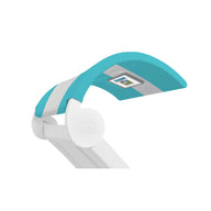 The Signature Chaise Shade by Ledge Lounger is a sleek, adjustable modern LED desk lamp in turquoise and white. It features a digital display on the head, ideal for media viewing and embodying contemporary aesthetics.