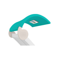 The Signature Chaise Shade by Ledge Lounger is showcased with a modern turquoise canopy attached to a white frame, complete with a built-in solar panel on top. The brand logo is prominently displayed on the circular attachment point, adding style and functionality.