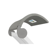 The Signature Chaise Shade by Ledge Lounger is displayed in gray with a fabric cover and a media viewing window for visibility, featuring LEONE and CONVIVIO labels on the joints and a sleek white frame design.