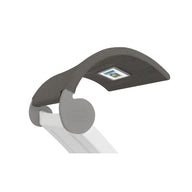 A close-up of the Signature Chaise Shades grey ergonomic headrest, featuring a media viewing window, curves forward and connects to a white metal frame marked Logic Connect by Ledge Lounger.