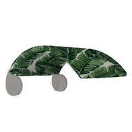 A decorative wall hook with a banana leaf pattern complements any Ledge Lounger Signature Chair Shade. Green leaves on a white background make it stylish, and it features two rounded ends for easy hanging.