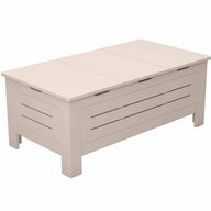 The Mainstay Storage Coffee Table by Ledge Lounger is a beige wooden piece with a slatted front and smooth top. It doubles as a storage bench with simple rectangular legs, offering ample space and a clean, modern design.