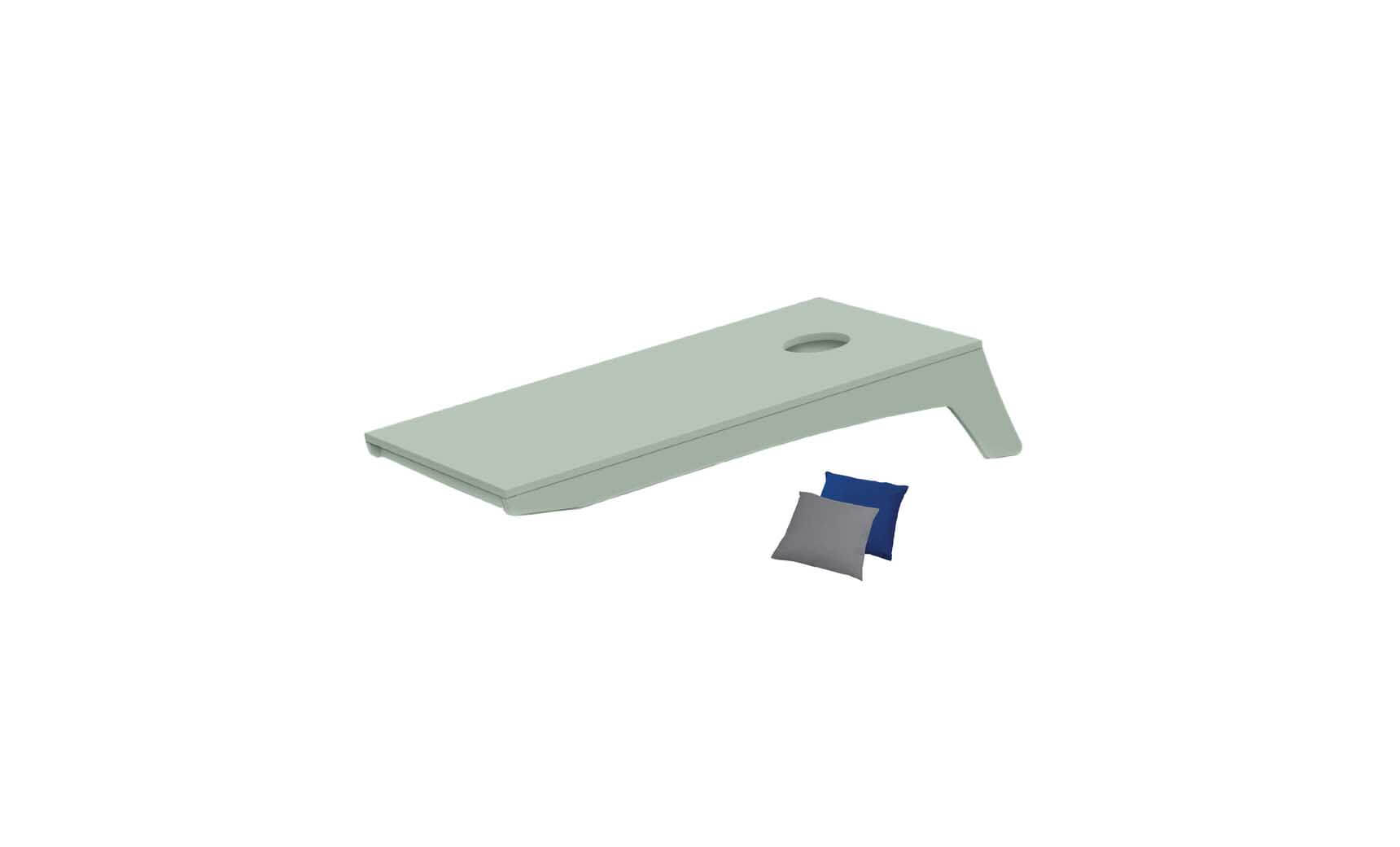 The Ledge Lounger Cornhole board, in green with a circular hole, rests on a white background. This portable set includes one blue and one gray bean bag, ideal for an impromptu game on the go.