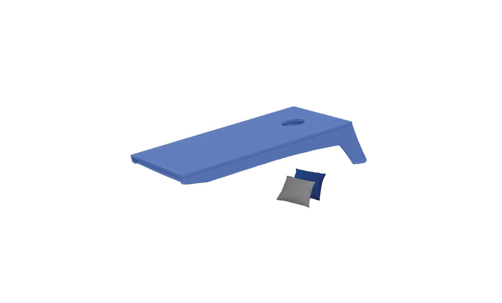 A Ledge Lounger Cornhole board features a circular top hole, with blue and gray bean bags beside it on a white background—perfect for a portable set.
