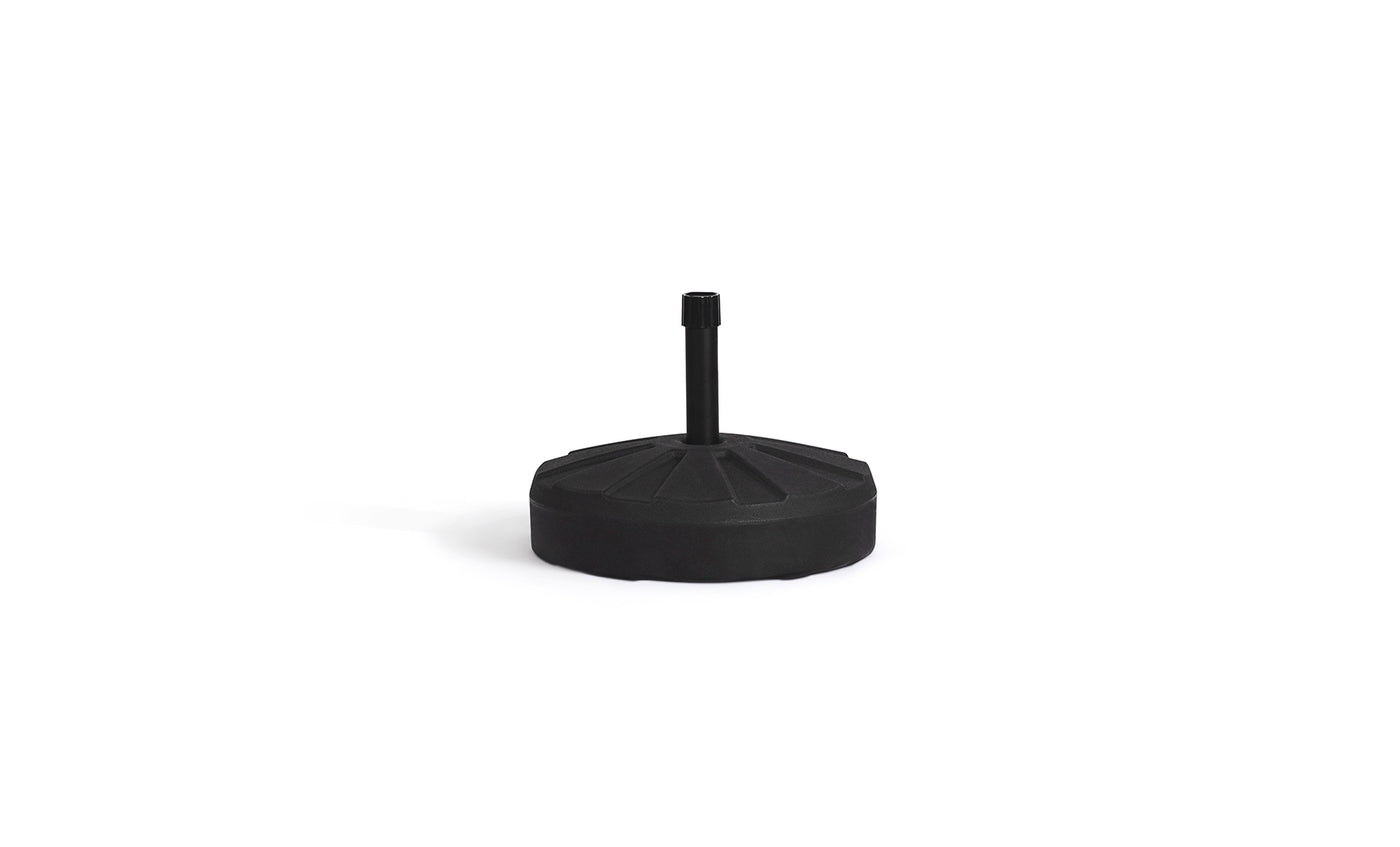 The Ledge Lounger Signature Fill-Up Base is a weather-resistant, black, round umbrella base with a vertical pole attachment and textured ridged surface for outdoor stability and style, shown against a plain white background.