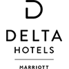 Silhouette of a person playing the guitar, seated with legs crossed. The headstock and tuning pegs are visible. The background is plain white.