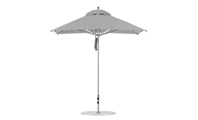 The Premier Aluminum Umbrella by Ledge Lounger, made of marine-grade fabric, features a square canopy with a pointed top and metal pole on a round base. Its symmetrical structure is fully opened with neatly secured ties.