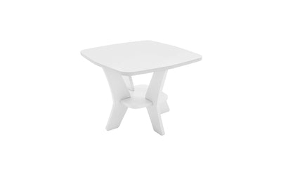 The Ledge Lounger Mainstay Square Side Table is a modern white piece featuring a sleek top and angled legs. Its minimalist design fits perfectly in contemporary interiors or adds chic appeal to your outdoor patio.