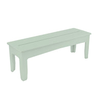 The Mainstay Dining Bench by Ledge Lounger is a light green wooden bench with a simple design, four legs, and a flat top featuring two long grooves. Its perfect for outdoor dining against a plain white background.