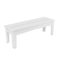 The Mainstay Dining Bench by Ledge Lounger is a sleek white rectangular bench with four legs, featuring a simple, smooth surface and clean lines. Ideal for modern or contemporary settings, it perfectly suits outdoor dining scenarios.