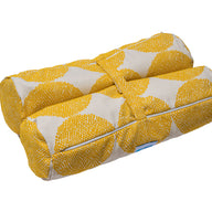 The yellow and white rectangular Ledge Lounger Laze Hammock cushion has a dot pattern, two cylindrical rolls, and a central fabric band, making it perfect for outdoor adventures and cozying up in a hammock.