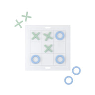 A giant Tic Tac Toe board by Ledge Lounger features green Xs and blue Os, with a winning diagonal of Xs from top left to bottom right. Nearby, two loose blue Os and one green X await the next round of this classic lawn game.