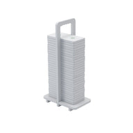 The Dominoes from Ledge Lounger are stacked white square plates with rounded edges, arranged vertically on a holder with a top handle. Their minimalist design resembles giant dominos, showcasing neat uniformity and high-quality craftsmanship.