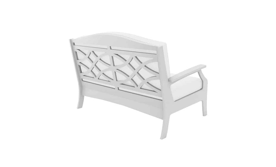 The Legacy Loveseat by Ledge Lounger is a white wooden bench featuring a decorative lattice backrest, smooth armrests, and a slightly curved seat for cushioned comfort. Photographed from the back on a plain white background, it enhances any outdoor space with tranquility.