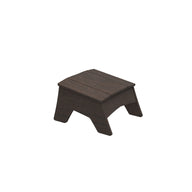 The Mainstay Adirondack Ottoman by Ledge Lounger is a compact, dark brown piece with a simple rectangular top and four robust legs, crafted from high-quality materials, ideal for any outdoor patio.