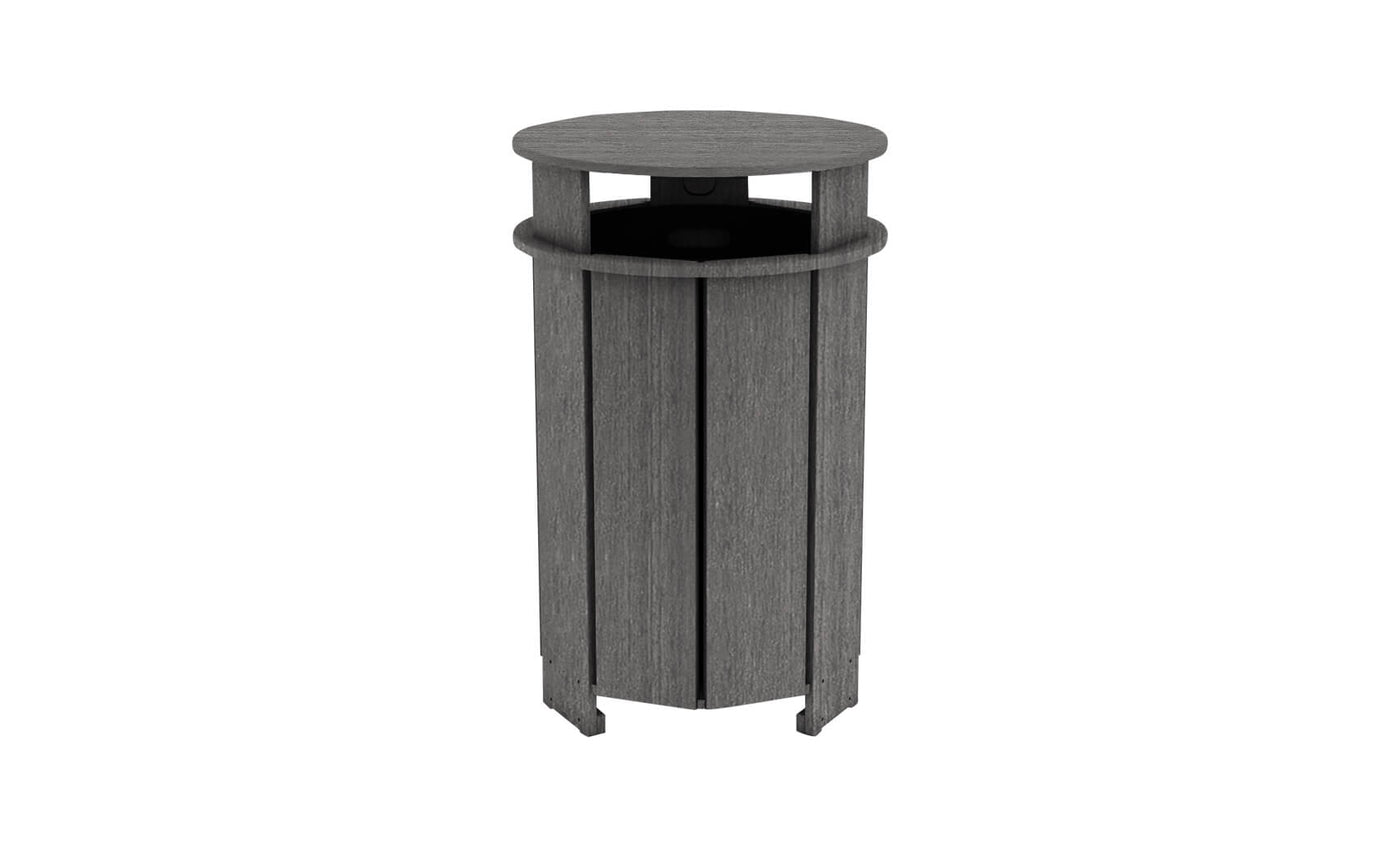 The Mainstay Trash Bin by Ledge Lounger is a tall, cylindrical wooden trash can with vertical planks. It features a dark gray finish and an open top for easy disposal.