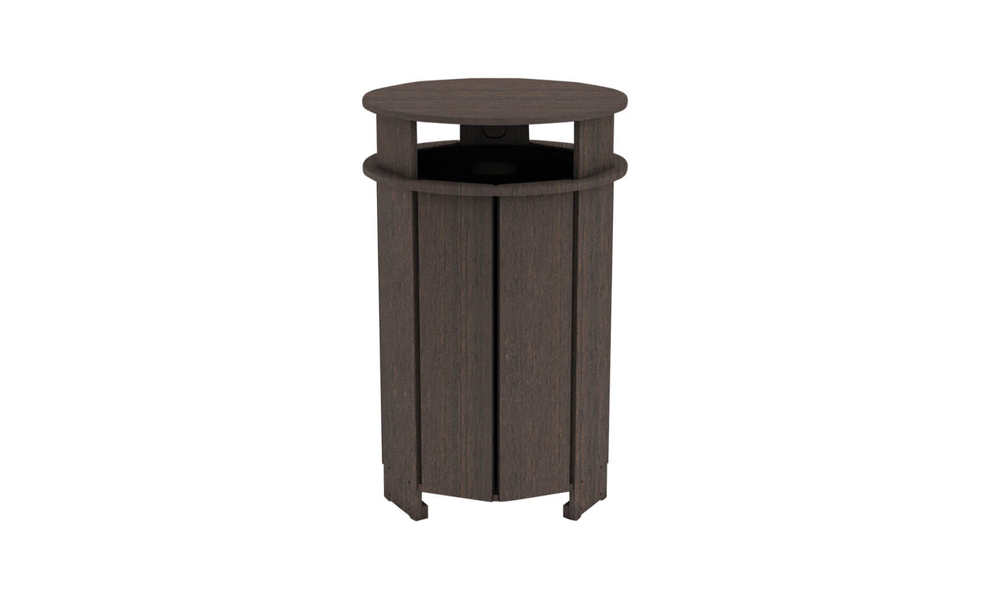 The Mainstay Trash Bin by Ledge Lounger is a dark brown, cylindrical patio trash can with vertical slats and an open top. Made from UV stable materials, it features a sleek design, perfect for outdoor or public spaces.