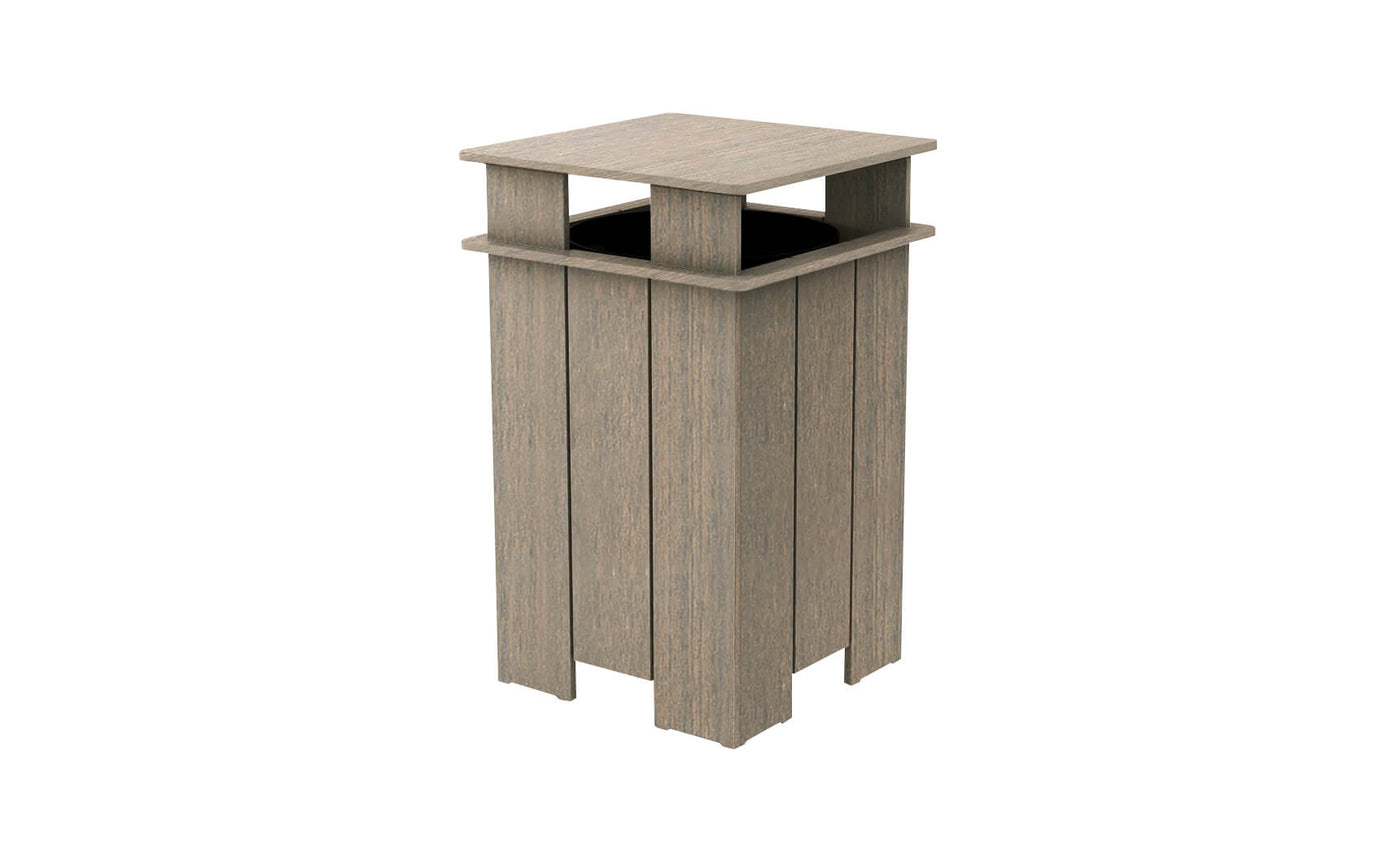 The Ledge Lounger Mainstay Trash Bin is a tall, square patio trash can with four vertical panels and an open top in a rustic gray finish. Made from UV-stable materials, its designed to be durable and withstand the elements for any outdoor space.